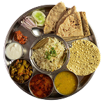 Roti Sabzii served with soft flatbread and colorful vegetable curry on a plate.